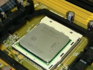AMD Phenom quad-core processor in its motherboard socket